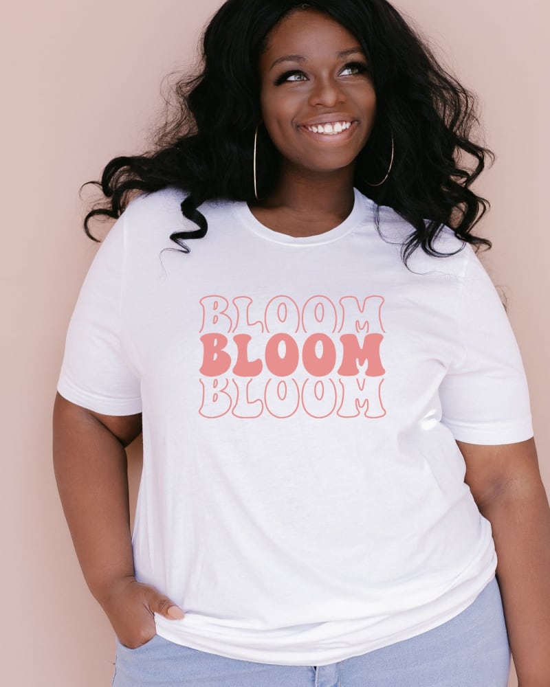 Front of a model wearing a size Large Bloom Stacked Colorful in White by Simply Sage Market. | dia_product_style_image_id:281361